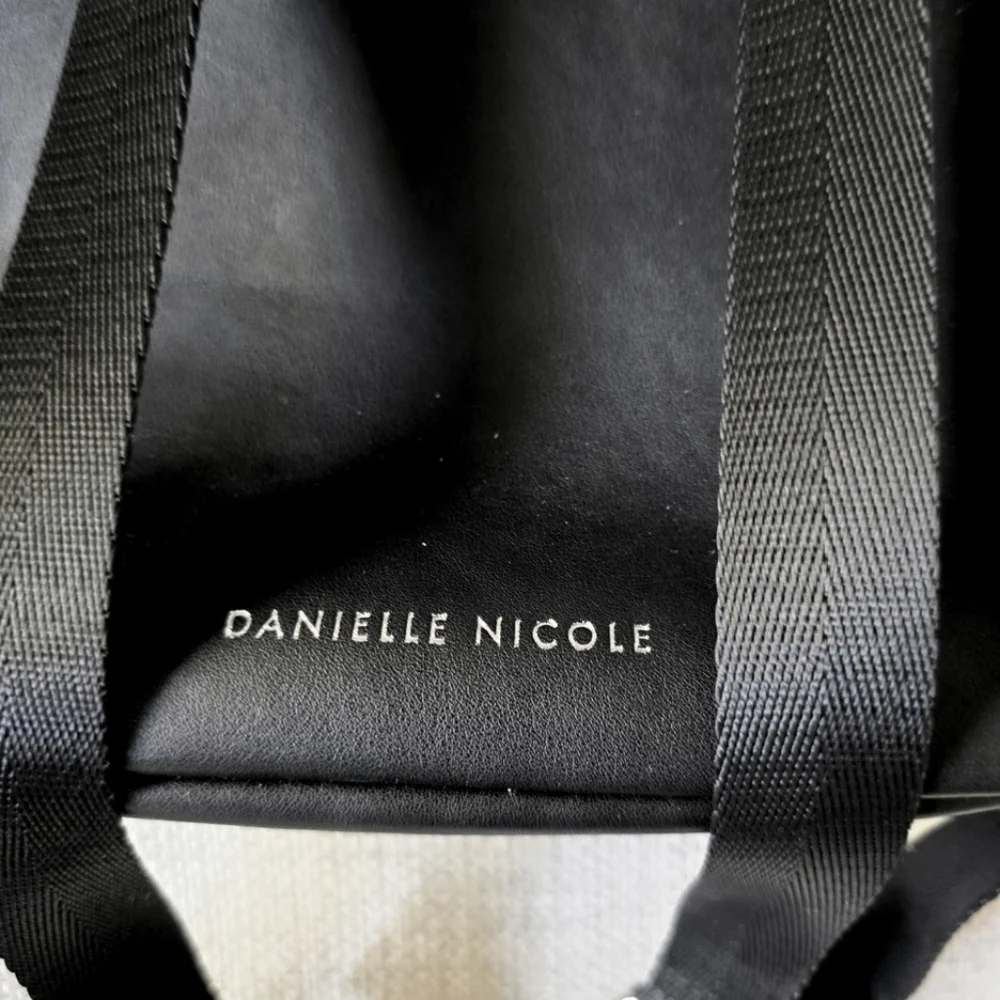 DISNEY Parks x Danielle Nicole Live Action MULAN Mini Backpack Armor Sword